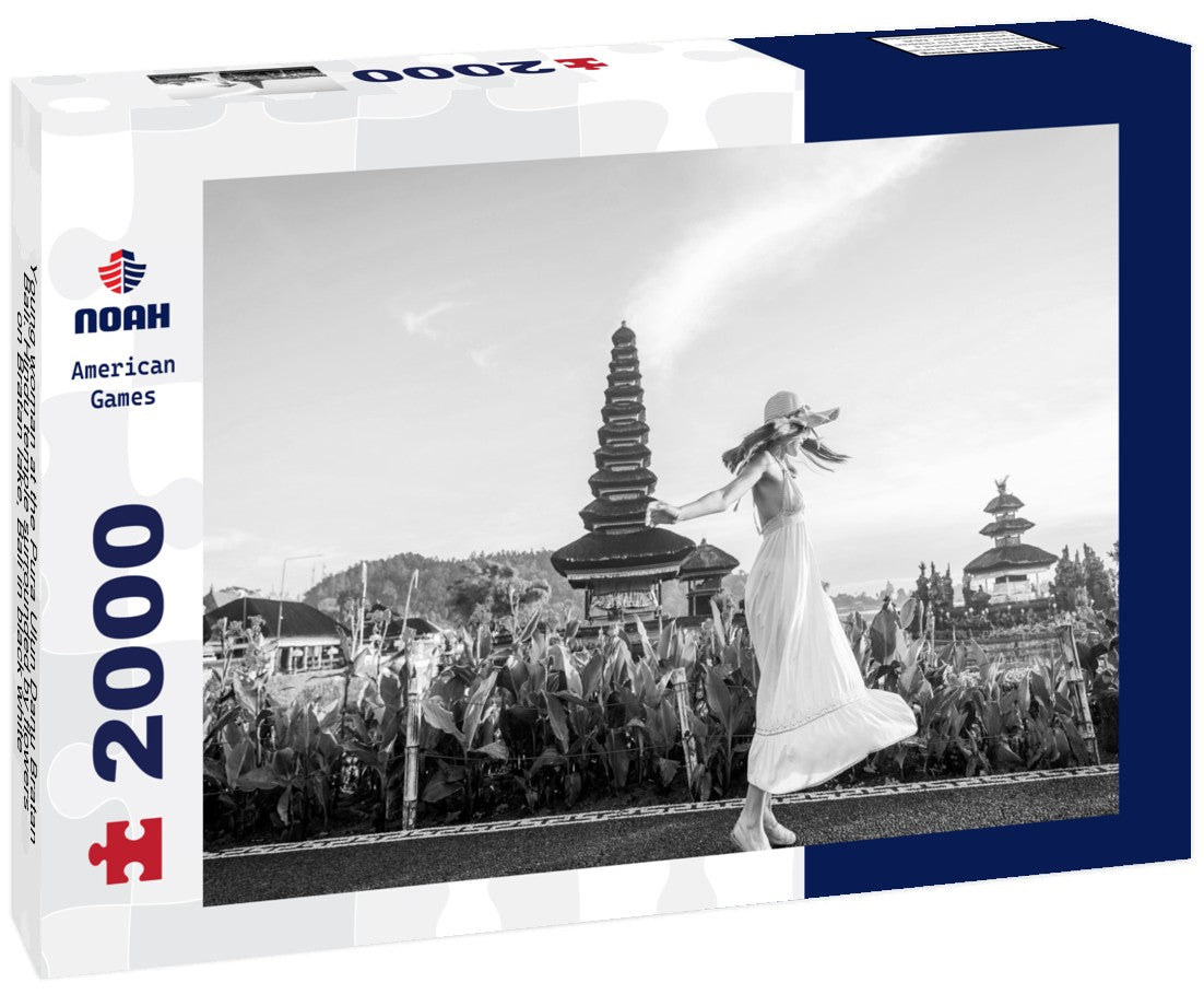Young woman at the Pura Ulun Danu Bratan, Bali. Hindu temple surrounded by flowers on Bratan lake, Bali 2000pc PuzzleBlack and White