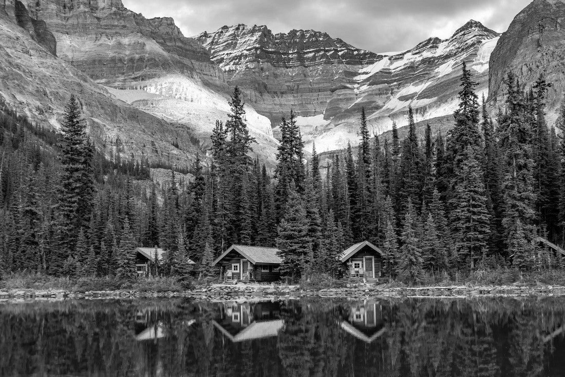 O'Hara huts reflecting in emerald lake water with mountain peaks in the background, Yoho National Park, Canada 2000pc PuzzleBlack and White