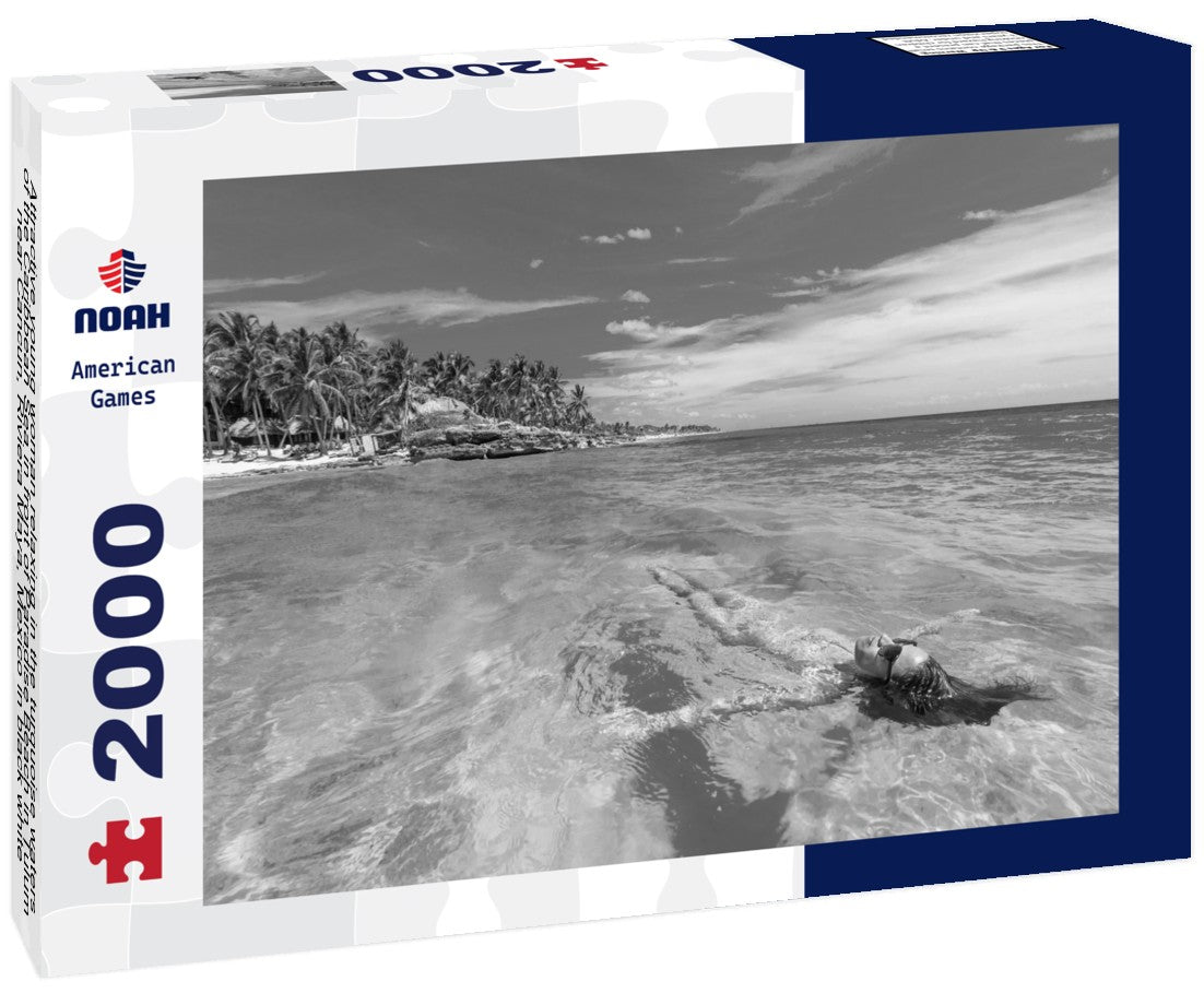 Attractive young woman relaxing in the turquoise waters of the Caribbean Sea in front of Paradise Beach in Tulum, near Cancun, Riviera Maya, Mexico 2000pc PuzzleBlack and White