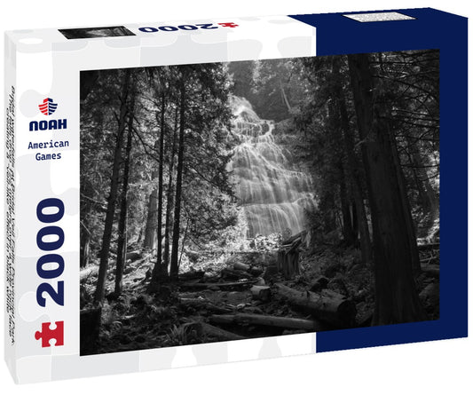 Noah Jigsaw Puzzle Bridal waterfalls at Bridal Veil Falls Provincial Park. The falls drop 122 meters over a wide rock face, creating a “veil-like” effect in black white 2000 pieces