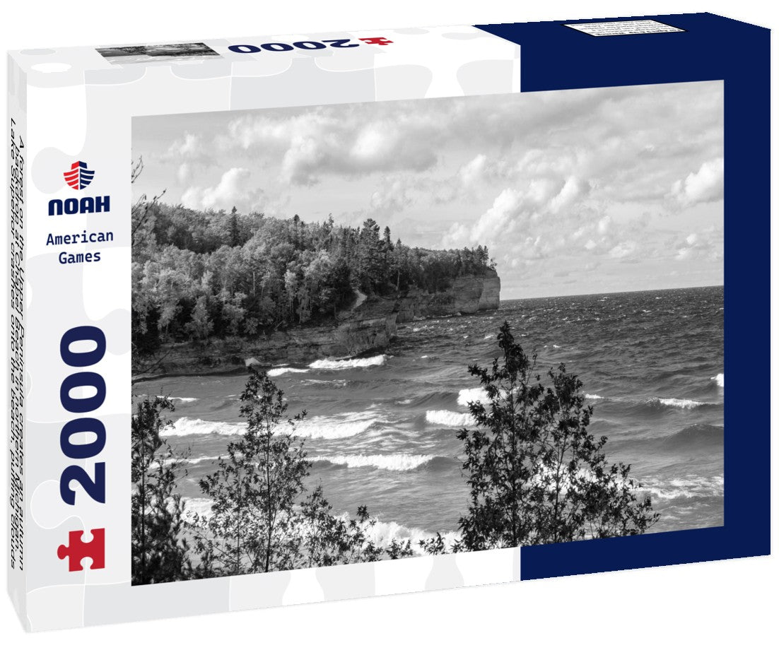 Noah Jigsaw Puzzle A forest on the Upper Peninsula creates an autumn backdrop at Chapel Beach in northern Michigan. Lake Superior crashes onto the beach, puffing clouds of white across the blue sky in black white 2000 pieces