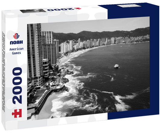 Noah Jigsaw Puzzle Acapulco Bay with its characteristic hotel line in front of a small beach with a beautiful blue ocean on a sunny summer day in black white 2000 pieces