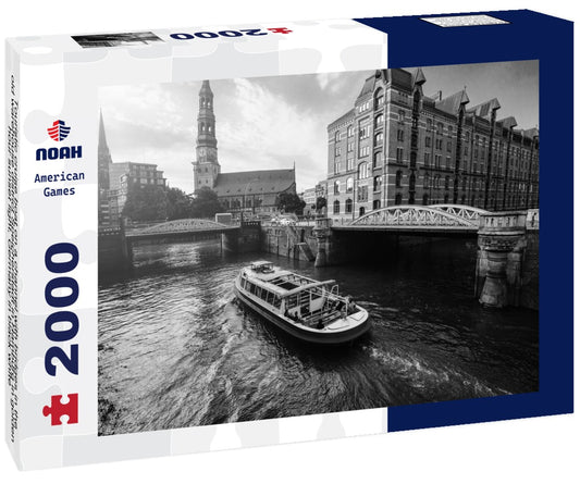 Noah Jigsaw Puzzle Touristic cruise boat on a channel with bridges in the old warehouse district Speicherstadt in Hamburg in golden hour sunset light, Germany in black white 2000 pieces