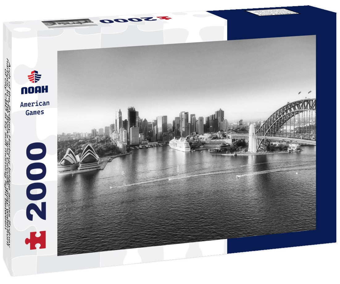 Arch of the Sydney Harbour bridge across Sydney harbour to The Rocks and Circular quay waterfront of city CBD lit by soft morning light between blue waters and sky 2000pc PuzzleBlack and White