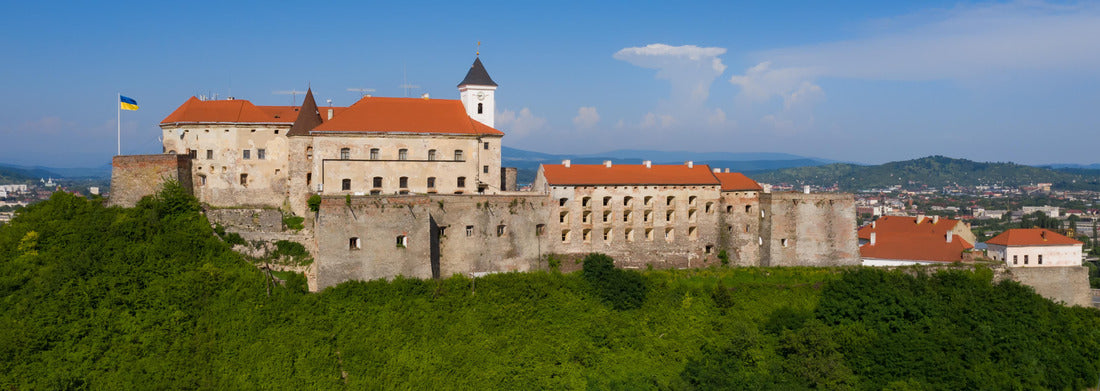 Picturesque view of Palanok Castle with its red roofs under the blue sky in Mukachevo, Transcarpathia in the Ukraine. Horizontal outdoor shot 1000pc Panoramic Puzzle