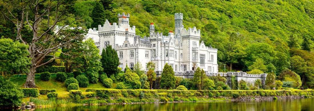 Kylemore Abbey with water reflections in Connemara, County Galway, Ireland, Europe. Benedictine monastery founded in 1920 on the grounds of Kylemore Castle. Mainistir na Coille Moire 1000pc Panoramic Puzzle