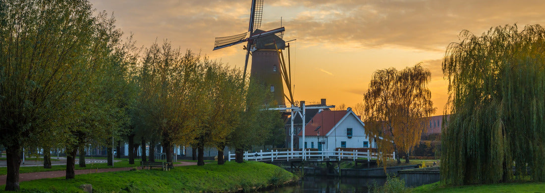 Noah Jigsaw Puzzle Typical Dutch landscape with a canal and a windmill at sunset, in Etten-Leur, North Brabant, Panorama 1000 Pieces
