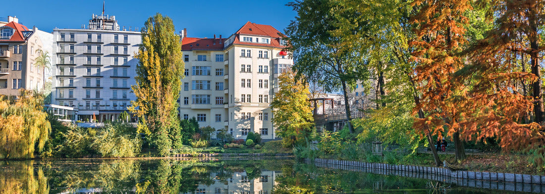 Noah Jigsaw Puzzle Park on the shore of Lake Lietzen with buildings reflected in the water in Berlin, Germany, Panorama 1000 Pieces