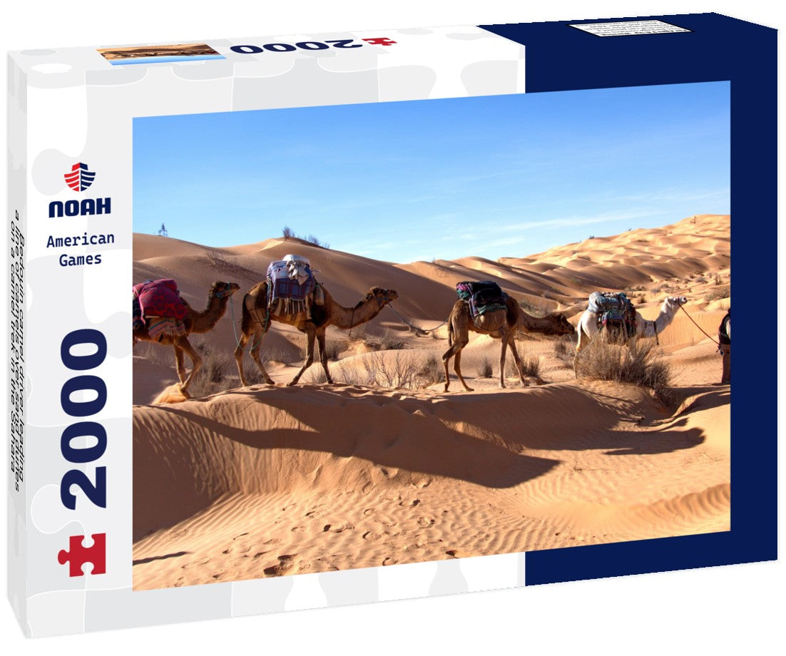 Bedouin camel driver leading a line of camels over sand dunes on a camel trek in the Sahara, outside Douz, Tunisia 2000pc Puzzle