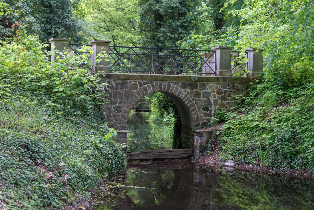 Serene arched bridge in Steinhöfel Palace Park, Brandenburg - the serene beauty of an English-style landscape garden 2000pc Puzzle