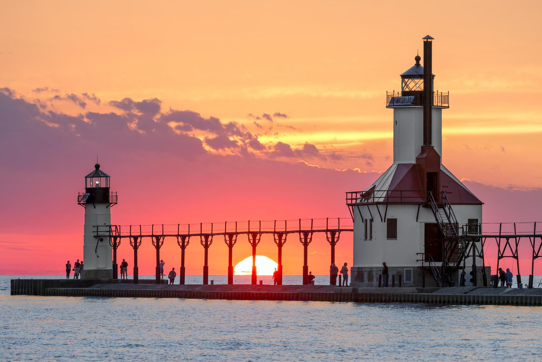 At the summer solstice, the sun rises over Lake Michigan between the Inner and Outer North Lighthouse in St. Joseph, Michigan 2000pc Puzzle