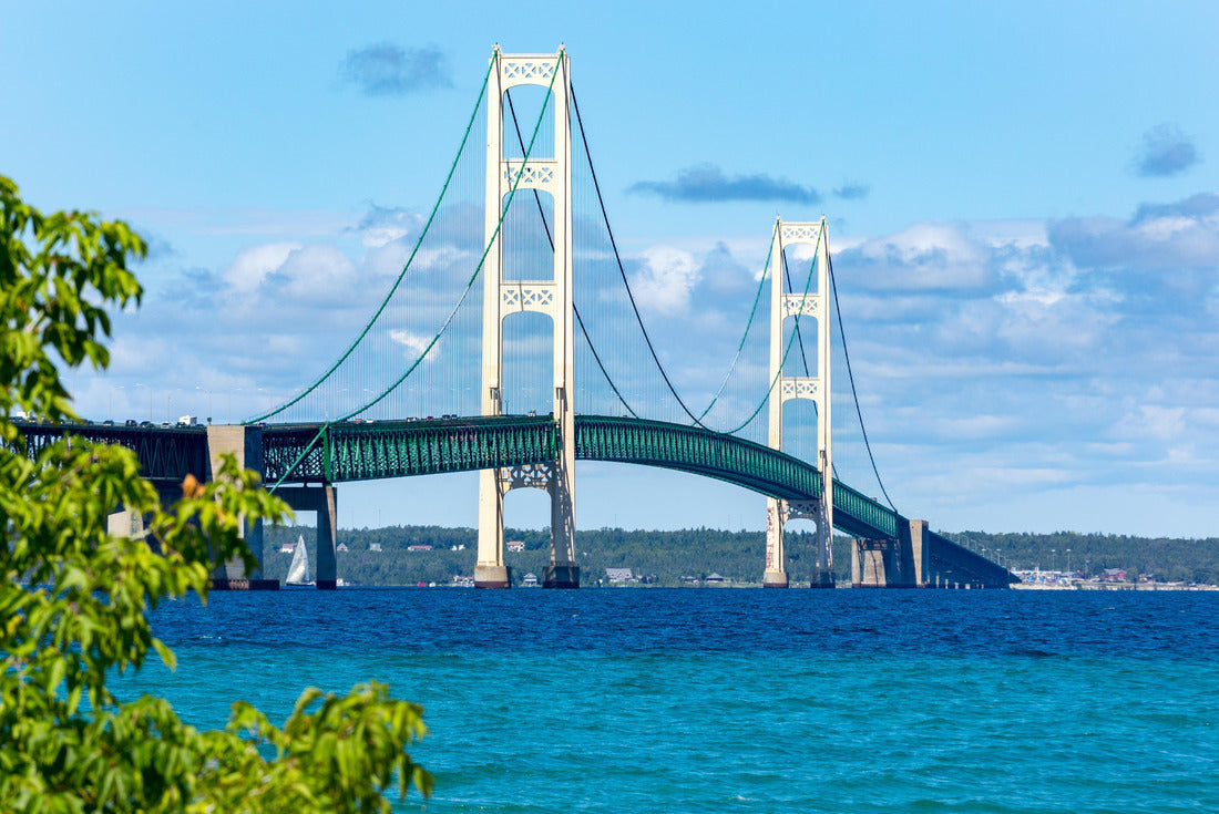 The Mackinac Bridge on a summer day. A suspension bridge over the Straits of Mackinac connecting the Upper and Lower Peninsulas of Michigan. Puff clouds in the blue sky 2000pc Puzzle