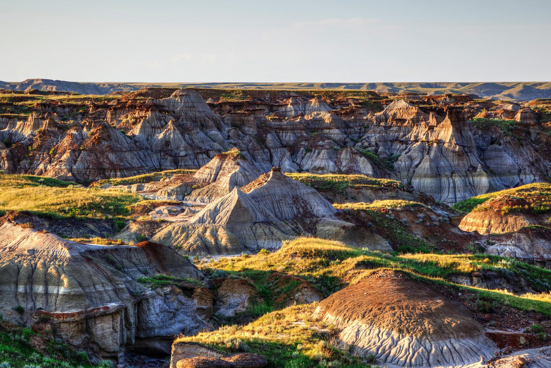 Sunset over Dinosaur Provincial Park, a UNESCO World Heritage Site in Alberta, Canada. The Alberta badlands are known for being one of the world's richest dinosaur fossil sites 2000pc Puzzle