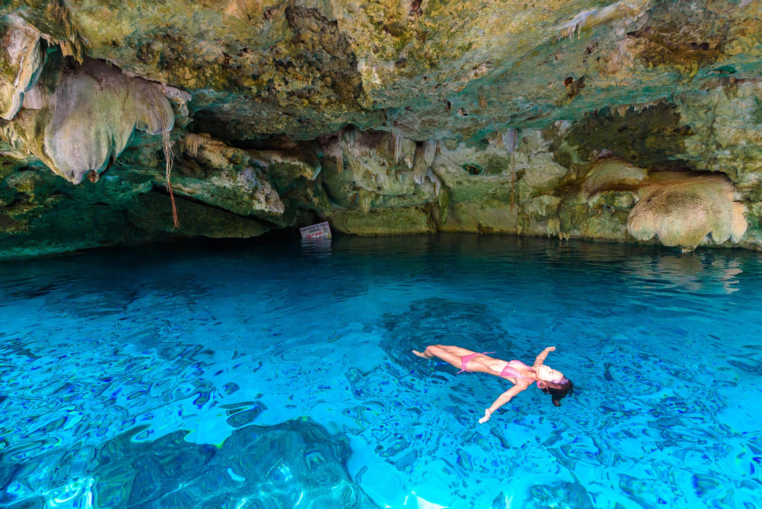 Cenote Dos Ojos in Quintana Roo, Mexico. People swimming and snorkeling in clear blue water. This cenote is located near Tulum on the Yucatan Peninsula, Mexico 2000pc Puzzle