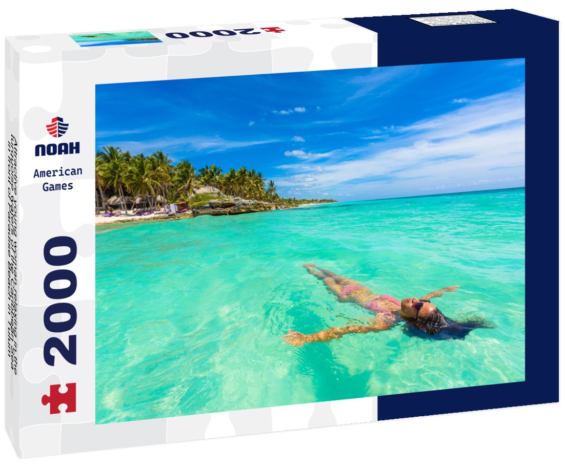 Attractive young woman relaxing in the turquoise waters of the Caribbean Sea in front of Paradise Beach in Tulum, near Cancun, Riviera Maya, Mexico 2000pc Puzzle