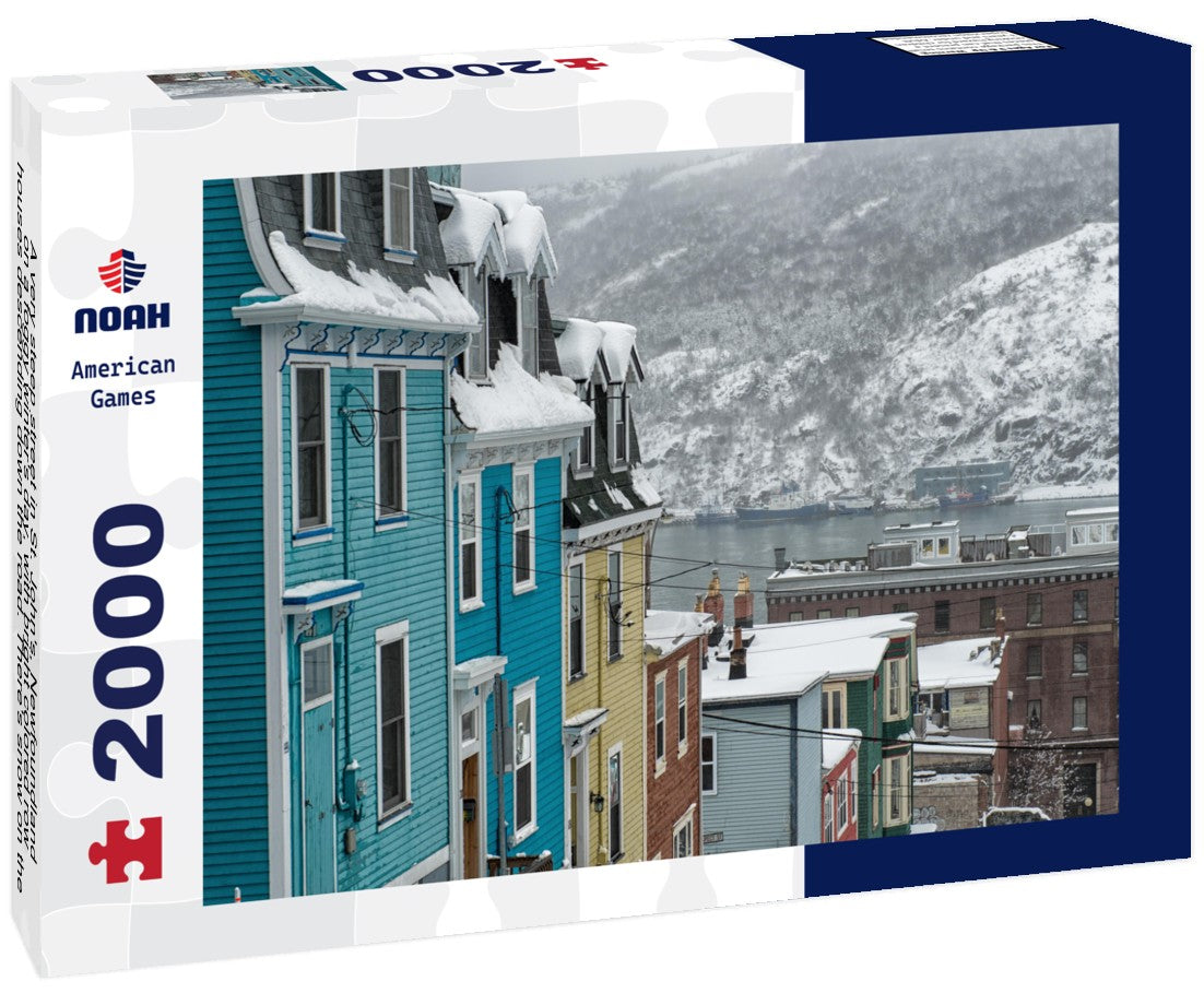 A very steep street in St. John's, Newfoundland, on a foggy winter's day, with bright colored row houses descending down the road. There's snow on the hillside in the background and a smooth harbor 2000pc Puzzle