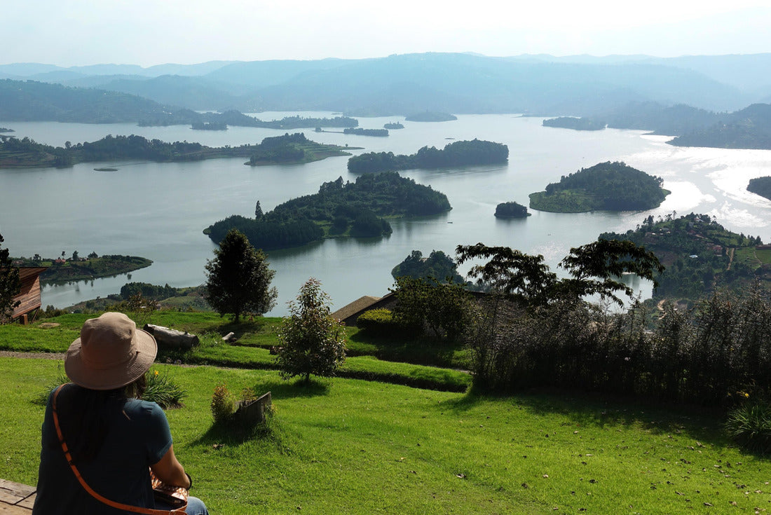 Noah Jigsaw Puzzle Woman taking a panoramic view of Lake Bunyonyi (place of many small birds) from Arcadia cottages in southwestern Uganda between Kisoro and Kabale, East Africa 2000 pieces