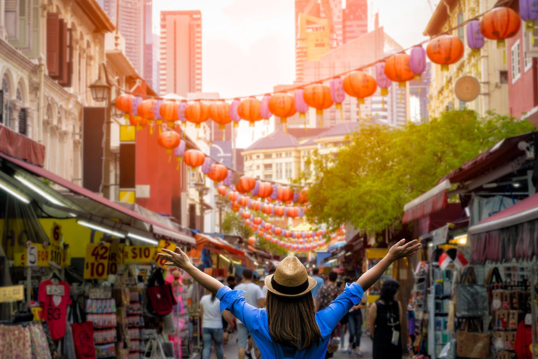 young traveler with backpack and hat traveling in downtown Singapore to Chinatown. Concept Travel in Singapore 2000pc Puzzle