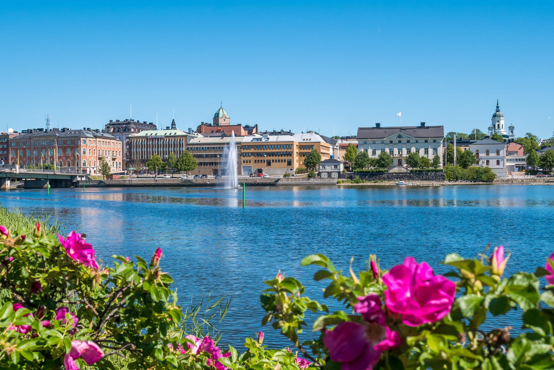 The city of Harnosand in north part of Sweden. Flowers and lake in foreground. Center in background 2000pc Puzzle