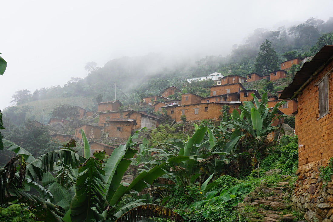 Small African village with houses on a mountain between banana trees on a mountain in Togo 2000pc Puzzle