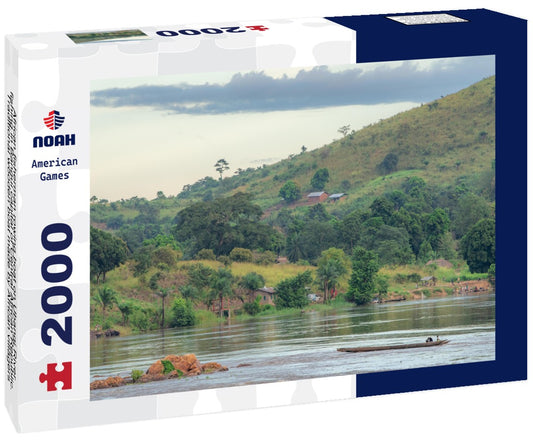 Noah Jigsaw Puzzle African fisherman rowing boat on Ubangi River, fishing in Bangui capital of Central African Republic. Traditional wooden boat made by African villagers 2000 pieces