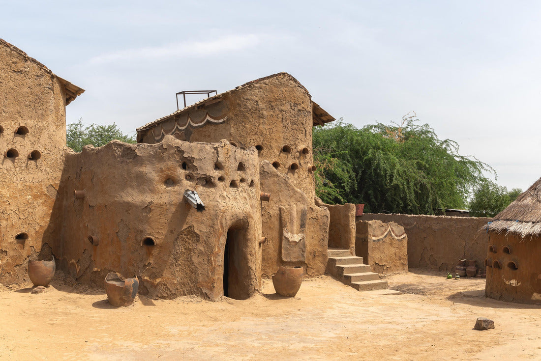 Traditional mud-built houses in Gaoui, Chad N'Djamena. Ancient antique houses in the Sahel desert and the Sahara. Hot weather in desert climate at the Chari River 2000pc Puzzle