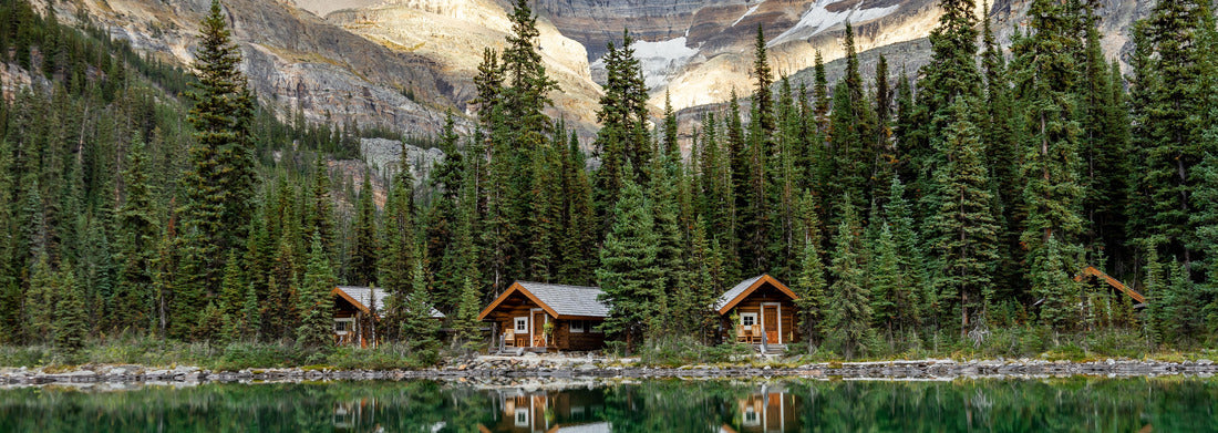Noah Jigsaw Puzzle O'Hara huts reflecting in emerald lake water with mountain peaks in the background, Yoho National Park, Canada panorama 1000 pieces