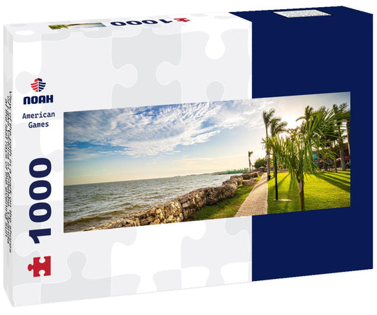 Noah Jigsaw Puzzle View of the path in a park on the shores of Lake Victoria in Entebbe, Uganda, at the last rays of the evening sun panorama 1000 pieces