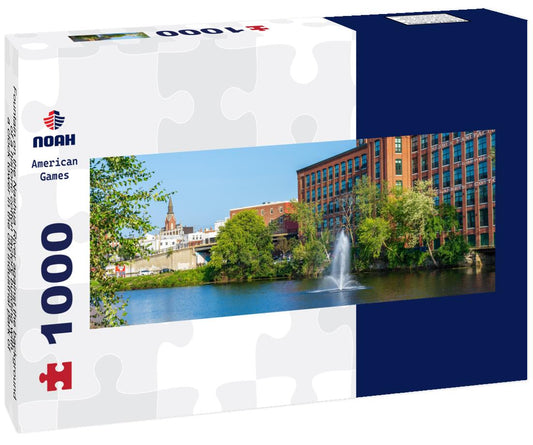 Noah Jigsaw Puzzle Fountain on the Nashua River against the background of a historic cotton factory building with a clock tower in the old industrial park of Nashua. New Hampshire, USA panorama 1000 pieces