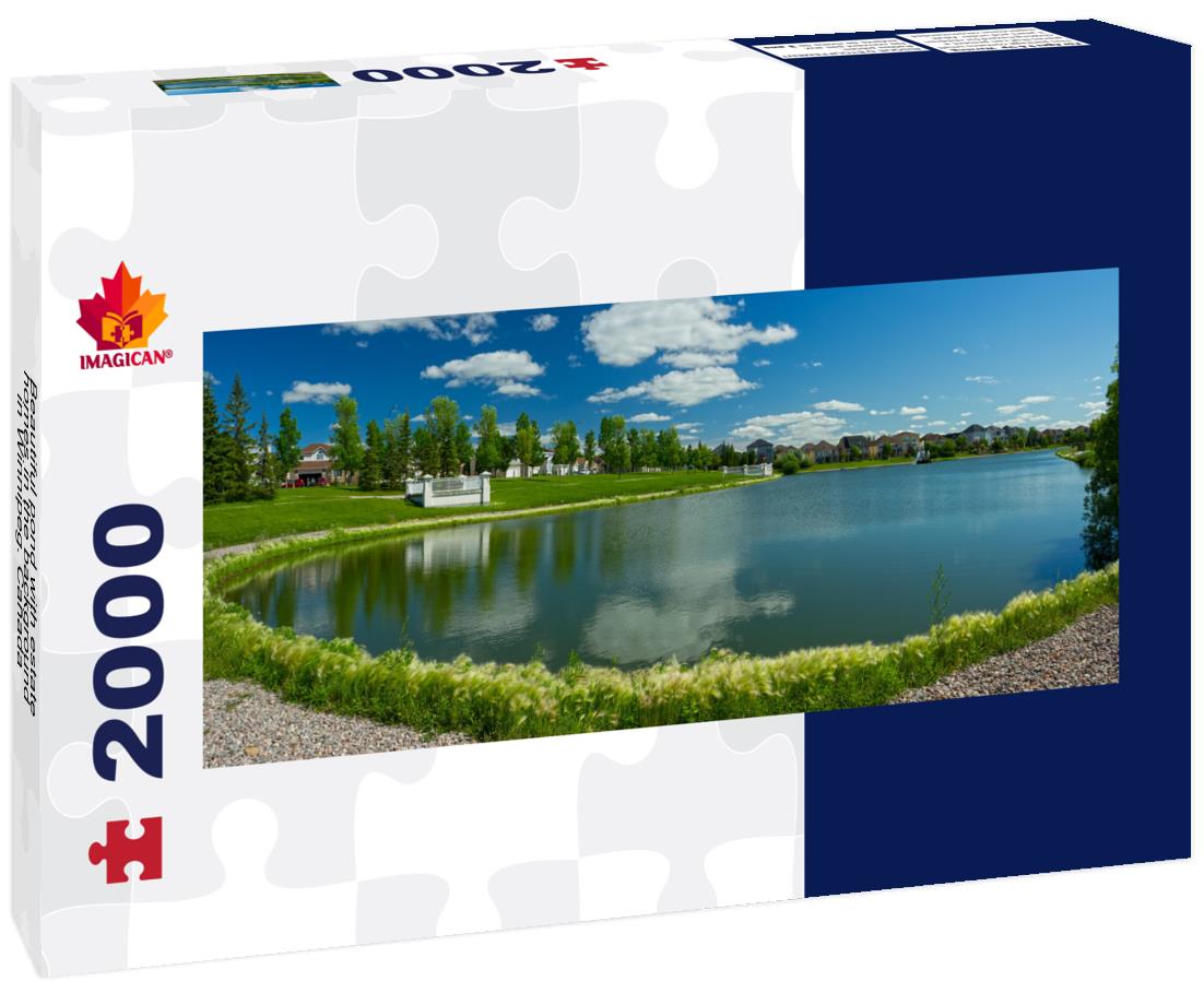Beautiful pond with estate homes in the background in Winnipeg. Canada 2000pc Panoramic Puzzle