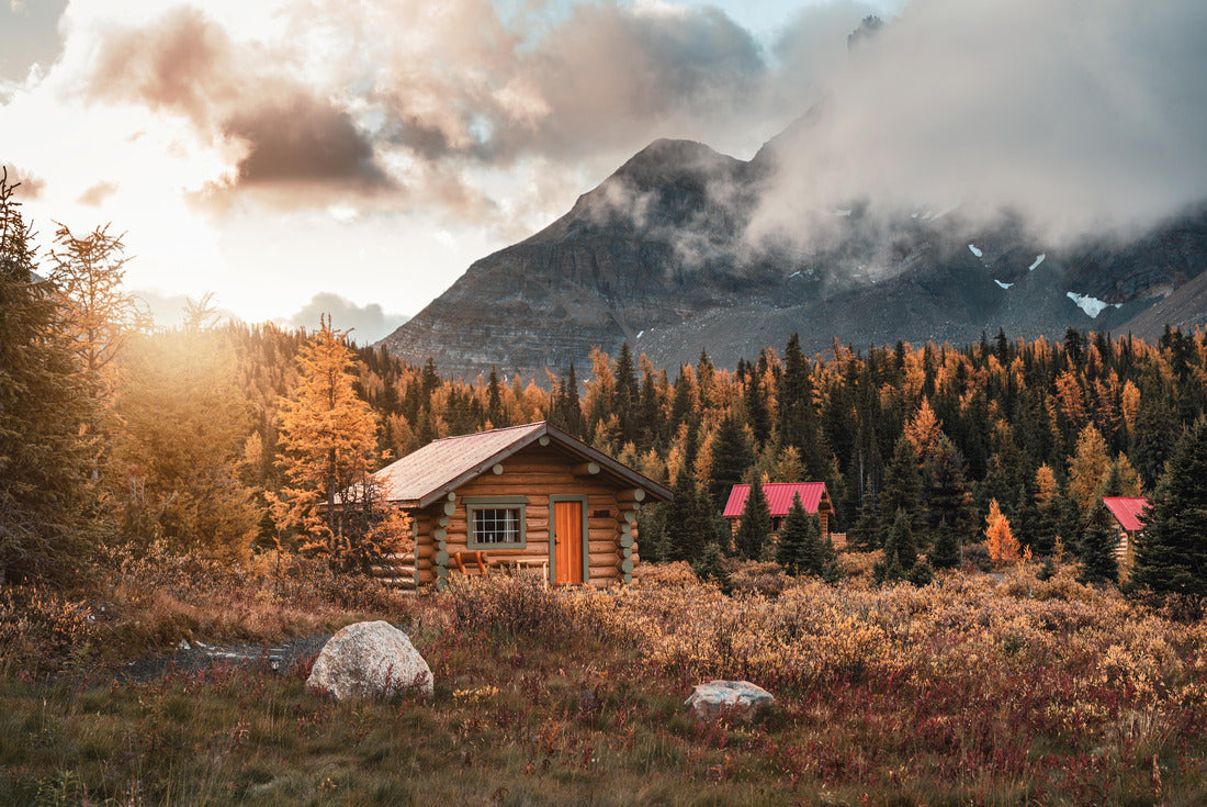 Cabins bathed in sunshine in the fall forest in Assiniboine Provincial Park, Canada 2000pc Puzzle