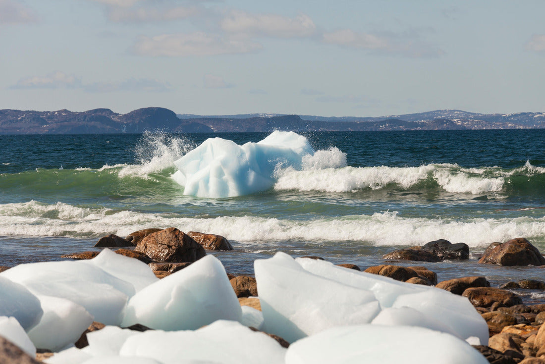 Waves crashing onto an iceberg, near the coast of Newfoundland and Labrador, Canada 2000pc Puzzle