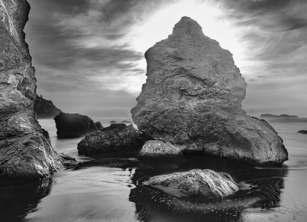 California dreaming, sunset mood on the beach at Mendocino, California in black white