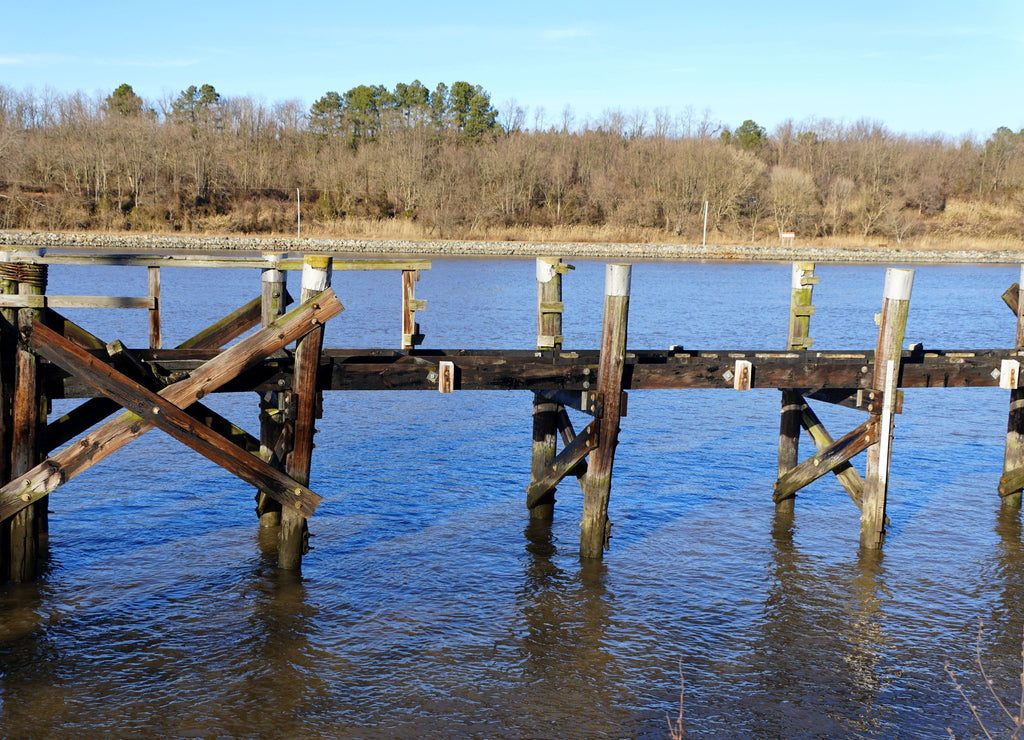 The abandoned wooden fishing pier by the Chesapeake Canal near Middletown, Delaware, U.S.A
