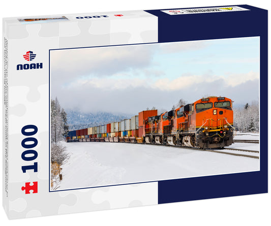 Winter scene of locomotive pulling freight cars close to Whitefish, Montana with fresh snow in the foreground and surrounding foliage