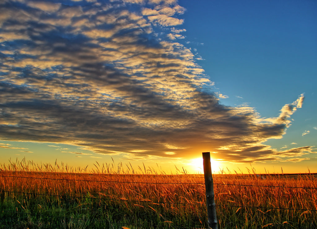 Ellis County, Kansas USA - A Spectacular Cloud Formation at Sunset over the Prairie Fields