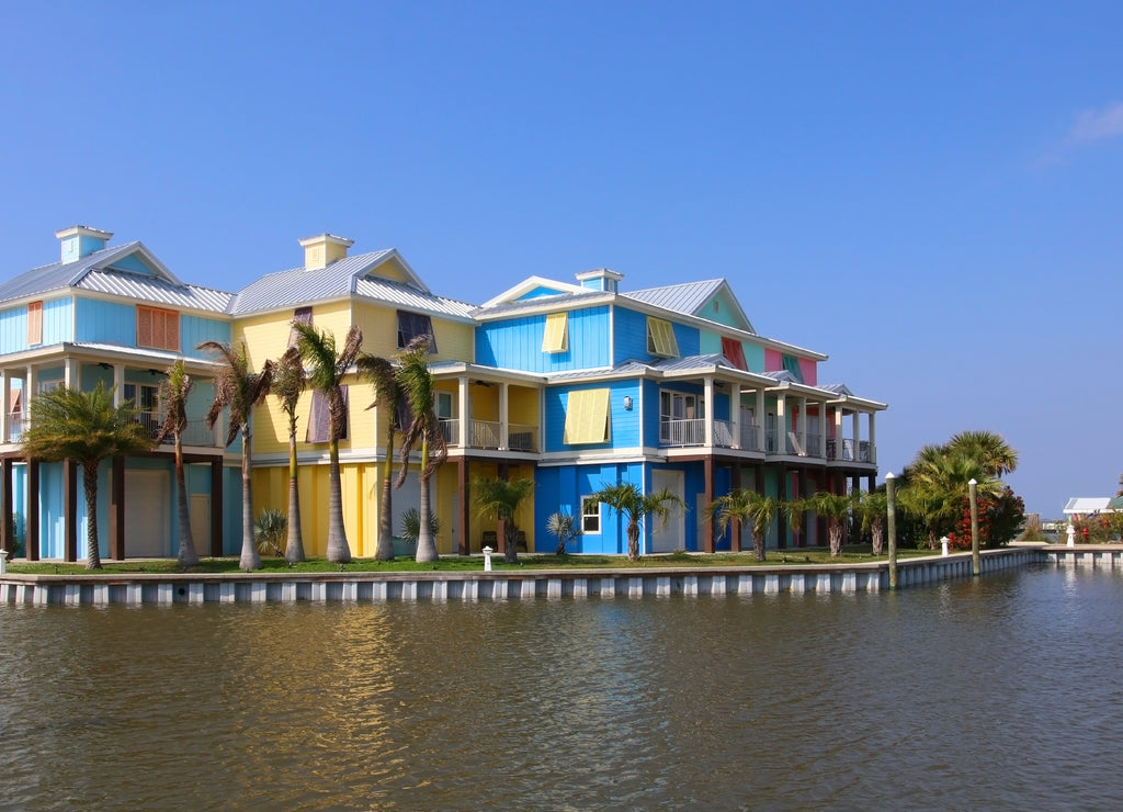 Travel America and visit Louisiana background. The neighborhood, rebuilt after a hurricane, with brightly colored houses for vacation rentals near Grand Isle State Park, Louisiana, USA