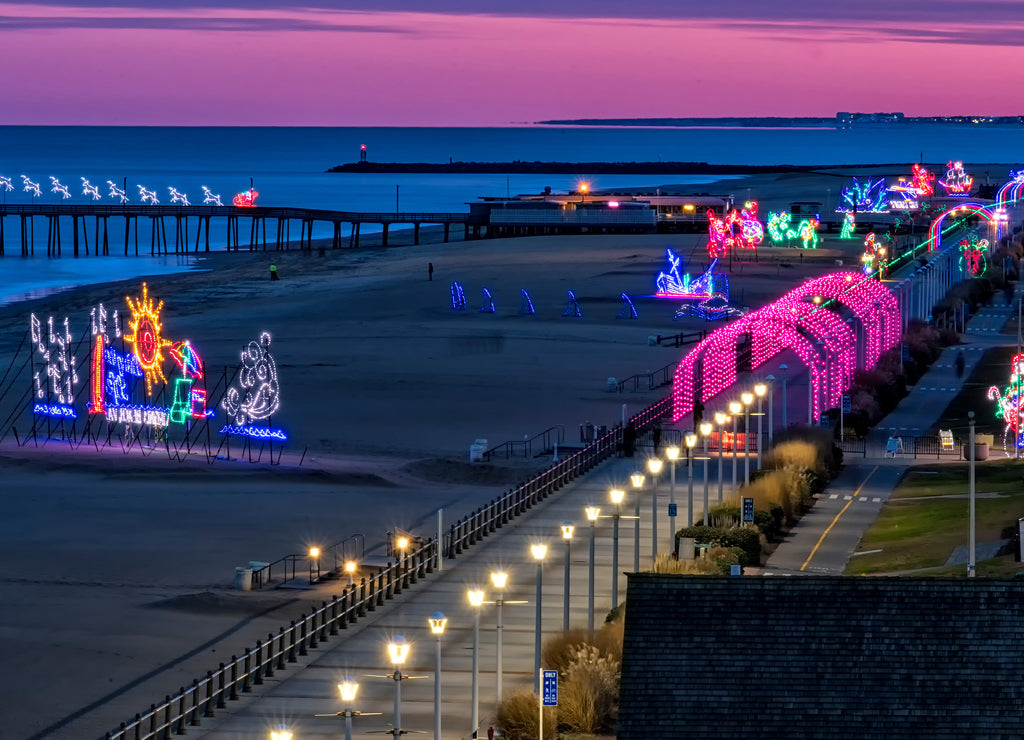Christmas lights along the boardwalk at sunset; Virginia Beach, Virginia