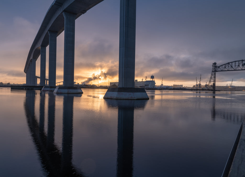 The massive Jordan Bridge over the Elizabeth River in Virginia, reflecting in the water at sunset, in high resolution