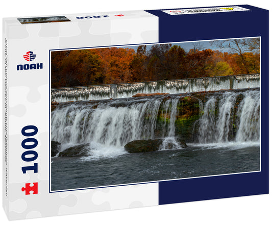 Vivid fall colors surround this fabulous waterfall scene in the Ozarks in Joplin, Missouri