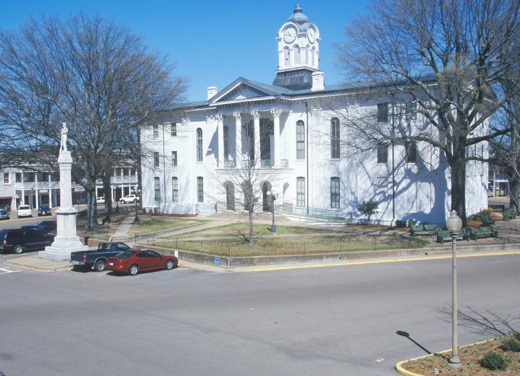 Lafayette County Court House in center of historic old southern town and storefronts of Oxford, Mississippi