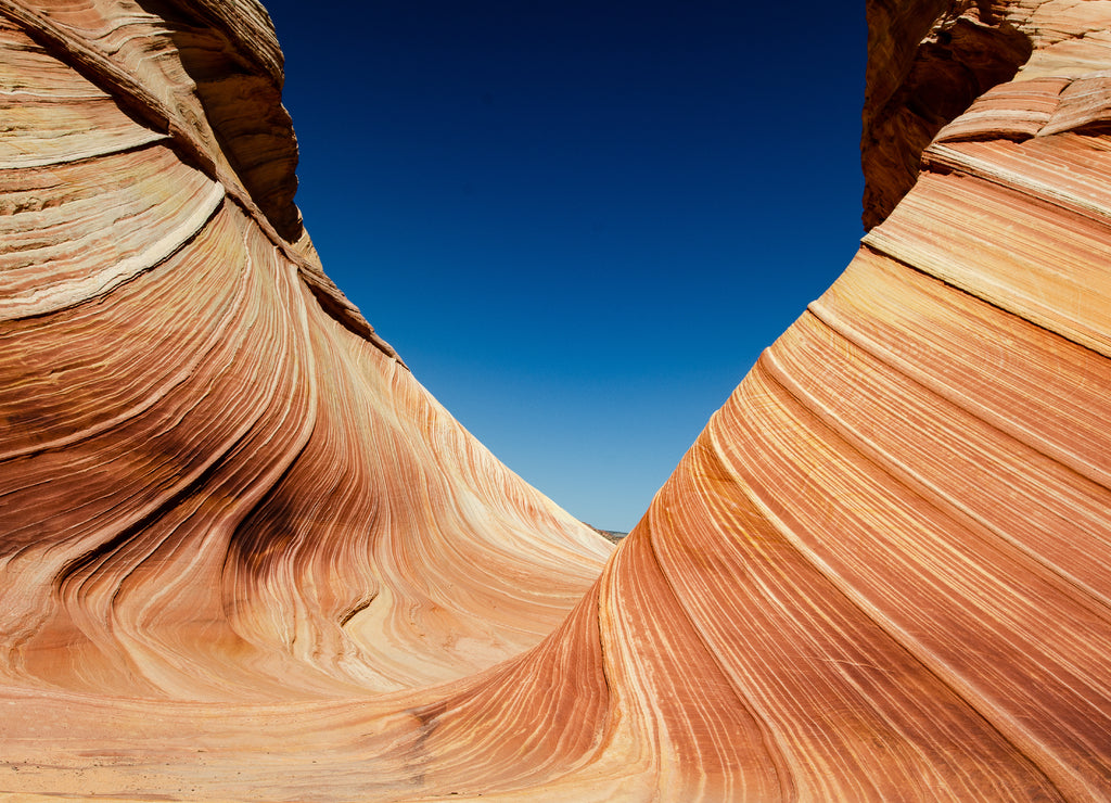 Perfect natural contrast taken from The Wave area on the border of Utah and Arizona near Coyote Butte in the Grand Circle. This premium geological formation is a point of interest for hikers, Utah