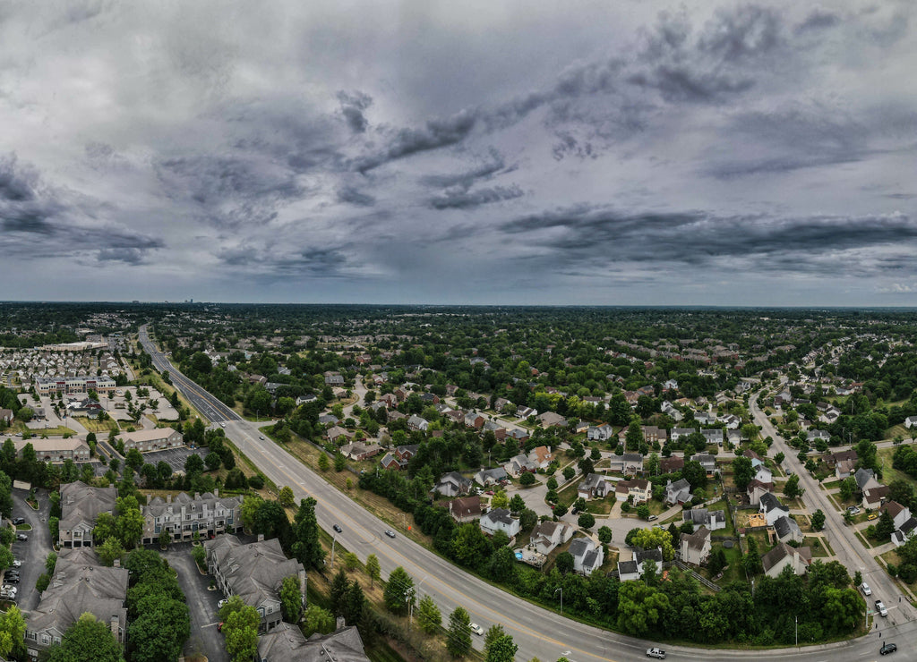 Aerial panorama of Lexington, Kentucky suburbs during dramatic clouds morning