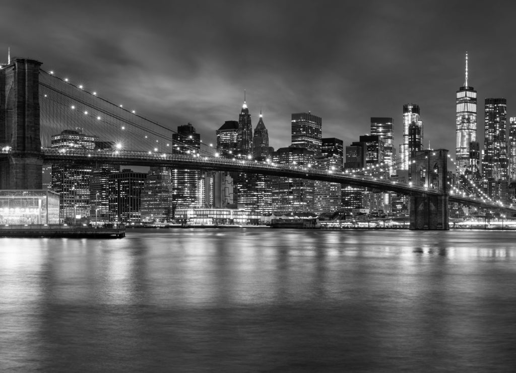 Brooklyn Bridge panorama at night, New York City, USA in black white