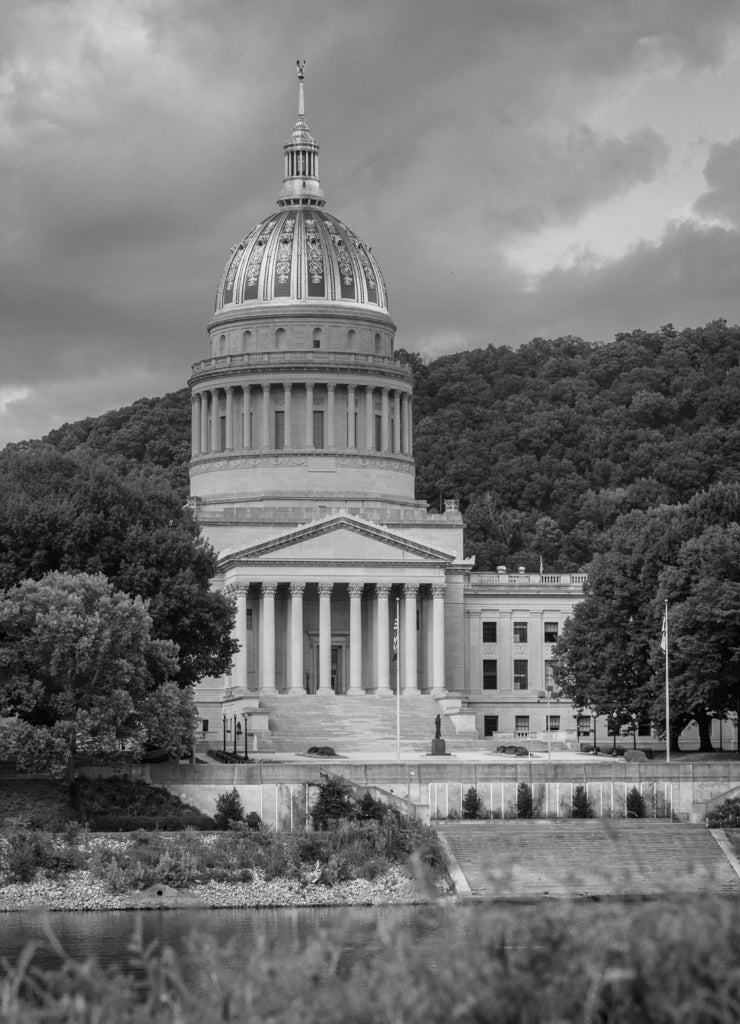 The West Virginia State Capitol and Kanawha River, in Charleston, West Virginia in black white