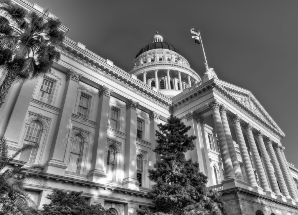 California State Capitol Lit by Setting Sun in black white