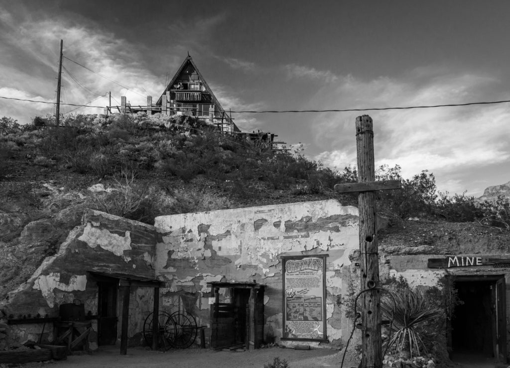 An old mine and house in Oatman, Arizona in black white