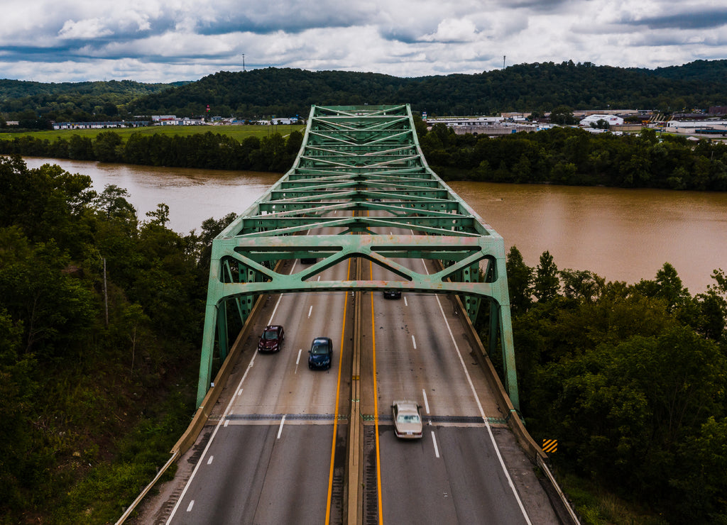 This is an aerial of a four-lane highway truss bridge that carries Interstate 64 over the Kanawha River near Nitro, West Virginia