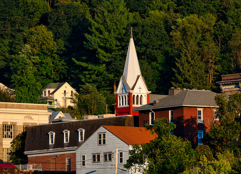 A church steeple towering above the building in Hinton, West Virginia, USA