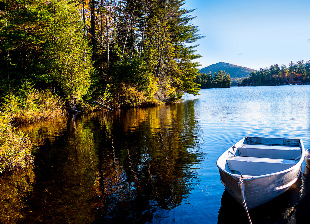 The lake and the rolling hills and clear, fresh air. In the midst of all that beauty sits Lake Placid, New York, a classic mountain town.It is a village in the Adirondack Mountains in Essex County New York